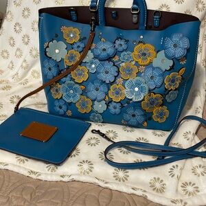 Coach bag as new. Comes with strap & zippered bag that attaches to purse.
